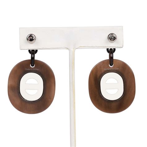 hermes buffalo horn earrings|HERMES brown black buffalo horn palladium hoop pin earrings .